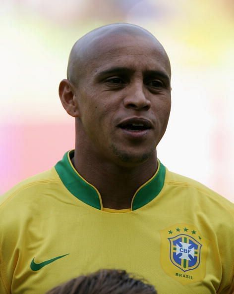 What does Roberto Carlos do now and which clubs did Brazil legend