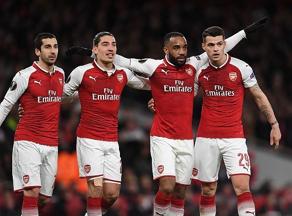Lacazette celebrates with his teammates after scoring Arsenal&#039;s fourth goal of the night