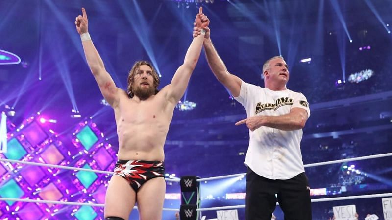 Shane McMahon and Daniel Bryan celebrate their win at WrestleMania 34.