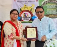 Mr. Gavaskar receiving a memento from Ms. Jennifer Dias. Principal of St. Xavier's High School, Fort