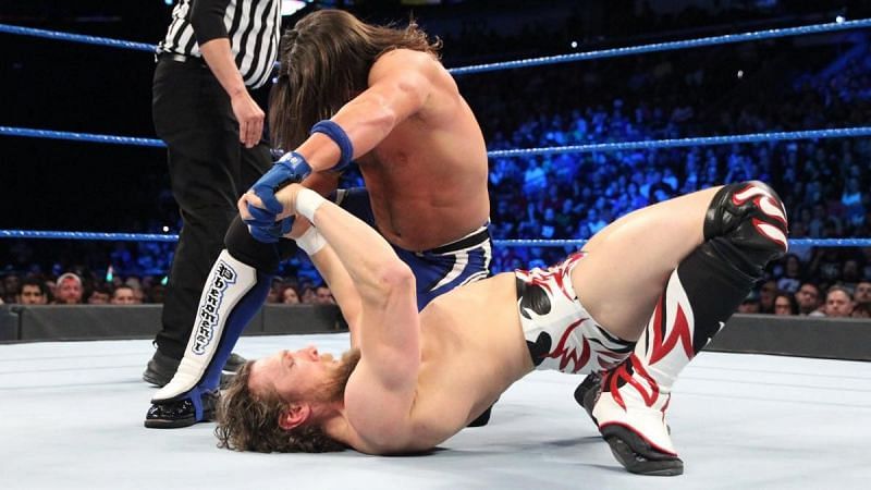 Daniel Bryan and AJ Styles square off inside the ring