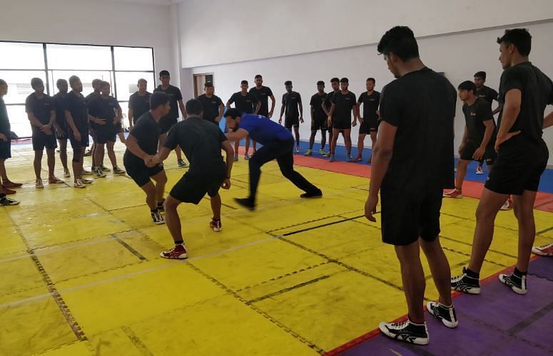 Manpreet Singh trains the young kabaddi players in Navi Mumbai.
