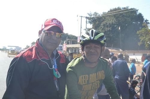 Abhishek (R) gets clicked with the Director of Special Olympics Bharat, Satbir Singh (L)