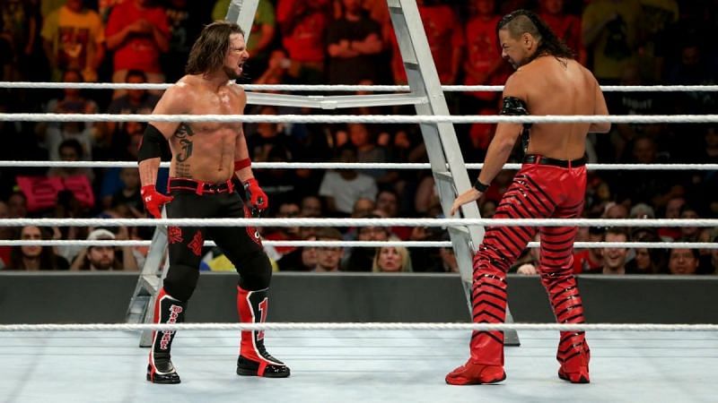 AJ Styles and Shinsuke Nakamura face off in the ring