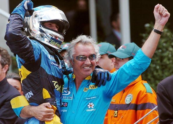 Italian Renault driver Jarno Trulli (L)