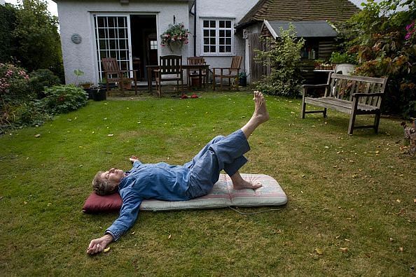UK - Old age - Pilates exercises in the garden
