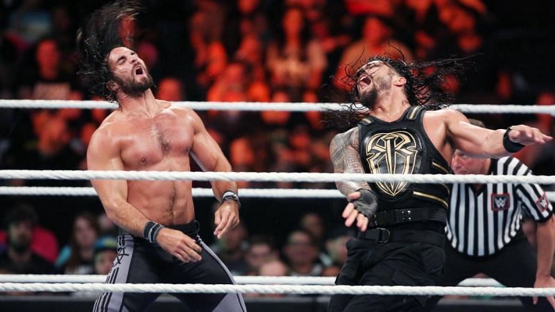 Roman Reigns and Seth Rollins mix it up in the ring