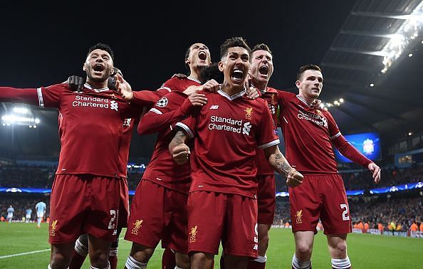 The Liverpool players celebrate a goal