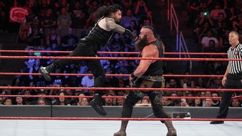 Roman Reigns hits Braun Strowman with a Superman Punch