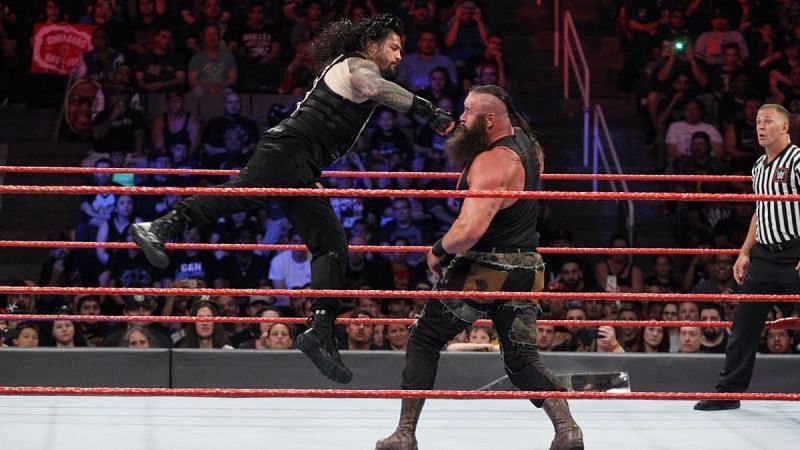 roman reigns superman punch pose