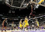 Dwyane Wade in action against Kobe Bryant and his Lakers