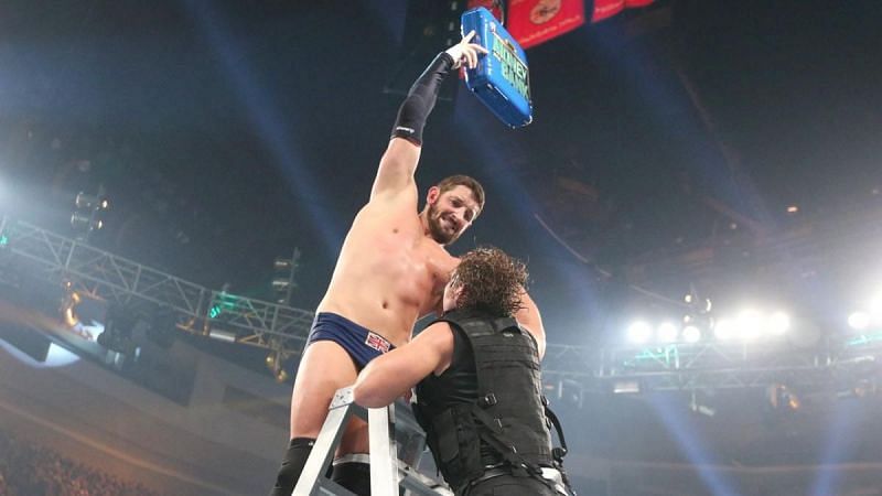 Wade Barrett reaches for the Money in the Bank briefcase