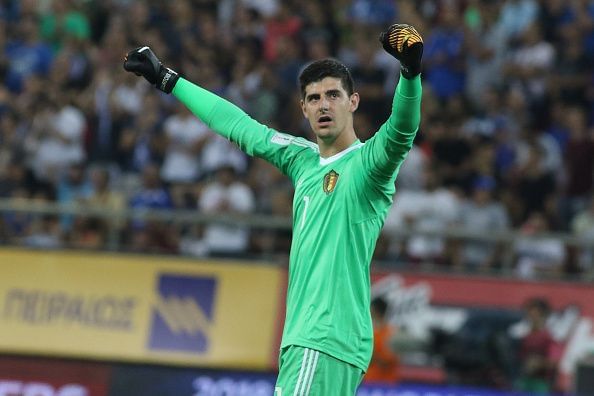 Belgium&#039;s goalkeeper Thibaut Courtois celebrates at the end...