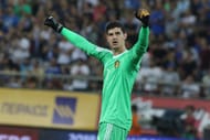 Belgium's goalkeeper Thibaut Courtois celebrates at the end...