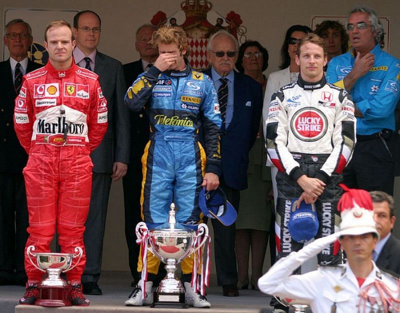 Jarno Trulli alongside Rubens Barrichello and Jenson Button