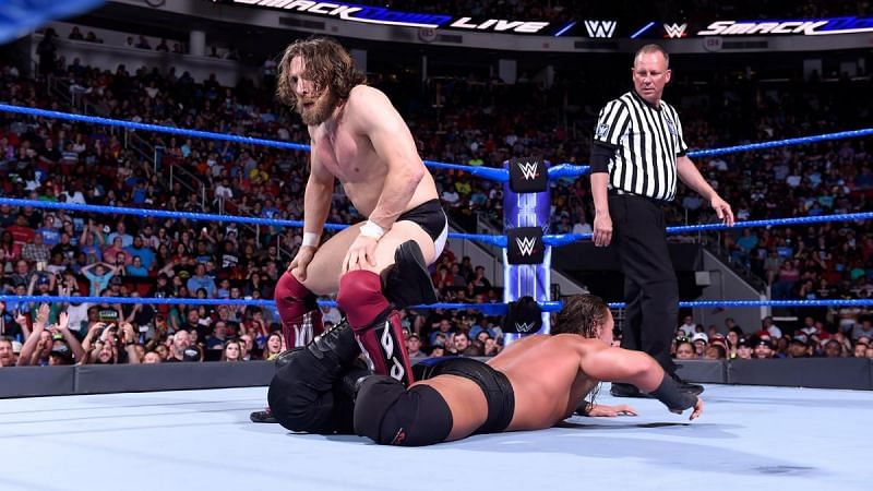 Daniel Bryan put pressure on the knee of Big Cass