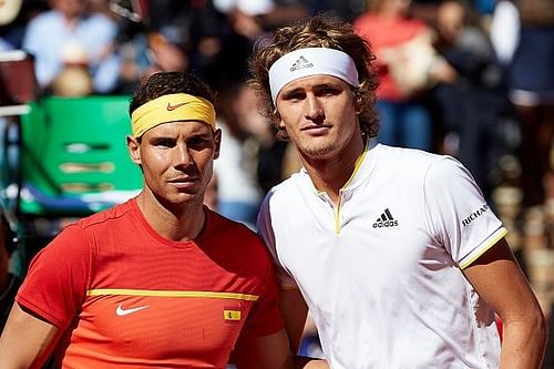 Rafael Nadal (L) of Spain poses for a picture with Alexander Zverev of Germany prior to their match during day three of the Davis Cup