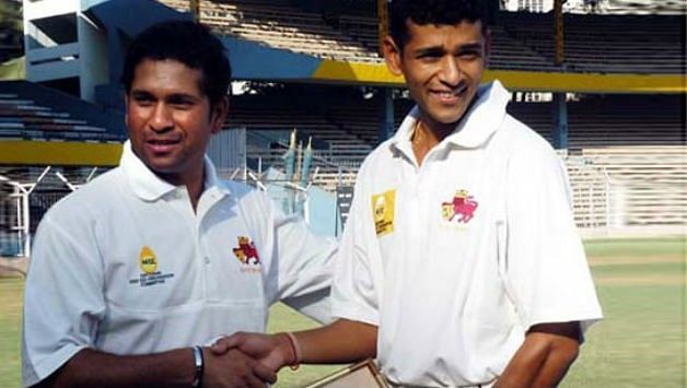 Sachin Tendulkar with Amol Muzumdar (in Mumbai whites)