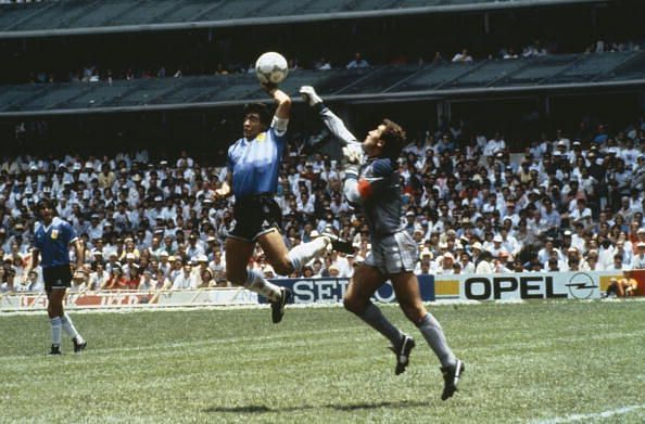 BT Sport. Football. 1986 Football World Cup, Mexico. Quarter Final, Argentina 2 v England 1. 22nd June, 1986. Argentina&#039;s Diego Maradona scores 1st goal with his Hand of God, past England goalkeeper Peter Shilton.