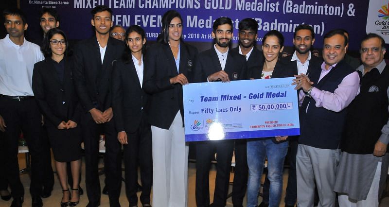 The Indian badminton contingent being felicitated by BAI and IOA president