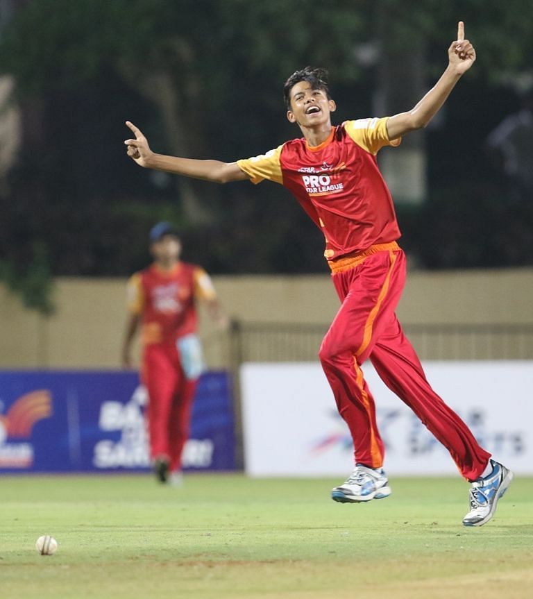 Player of Sanskar School, Jaipur celebrates after the fall of a wicket