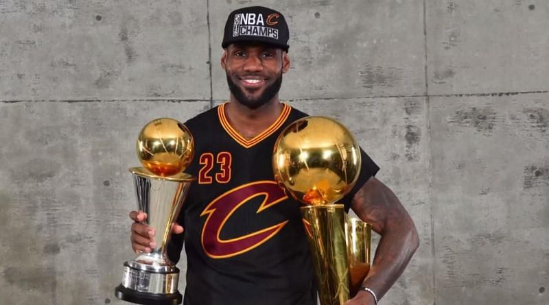 LeBron James, in 2016, with the NBA Championship trophy and the Finals MVP trophy
