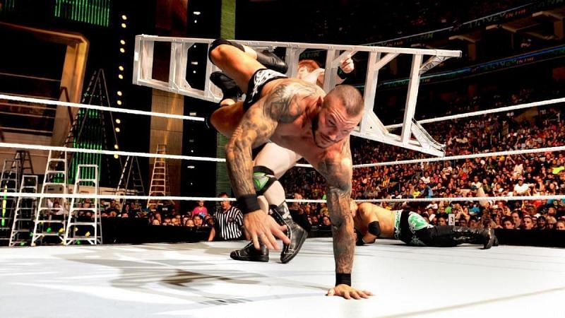 Randy Orton is hit with a ladder