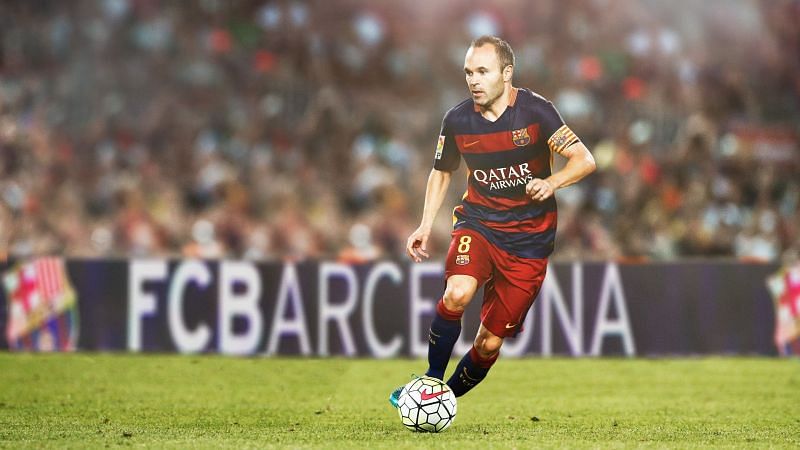 Andr&Atilde;&copy;s Iniesta is dyed in the blue and garnet colours of FC Barcelona