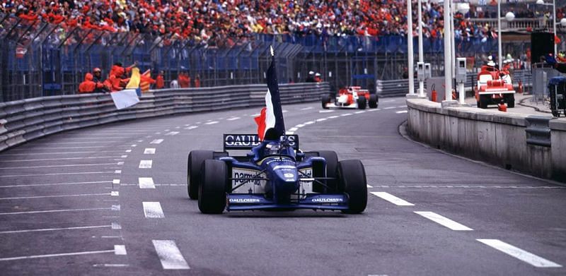 Olivier Panis waving the French Flag to take victory at the 1996 Monaco GP