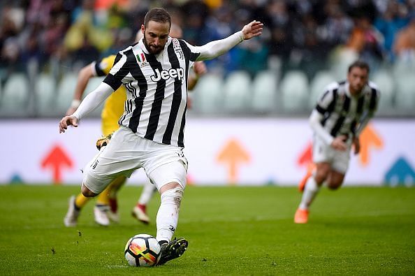 Gonzalo Higuain of Juventus FC fails to score a penalty kick...