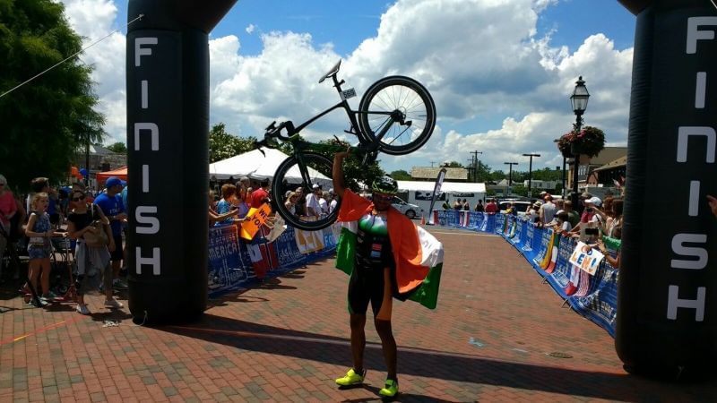 Amit Samarth celebrates as he finishes RAAM 2017