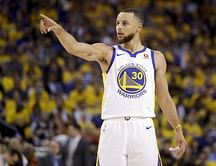 The Latest: Warriors top Cavs 124-114 in OT to open finals