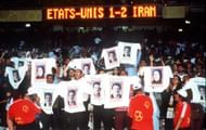 1998 World Cup Finals. Lyon, France. 21st JUNE 1998. USA 1 v Iran 2. Iranian fans celebrate after their team's win holding T-shirts displaying a political message.