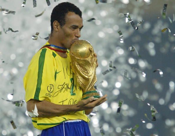 Brazil&#039;s team captain and defender Cafu kisses the