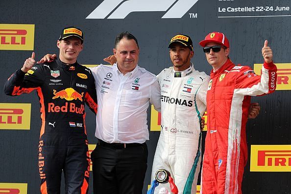 Top three finishers Lewis Hamilton of Great Britain and...