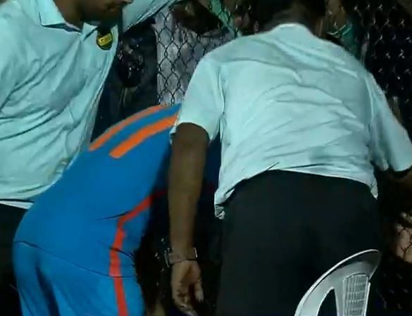 Sunil Chhetri goes over to the stands to present his captain&#039;s armband to a fan.