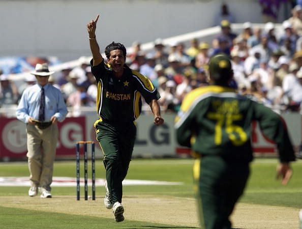 Wasim Akram of Pakistan celebrates the wicket of Marcus Trescothick of England 