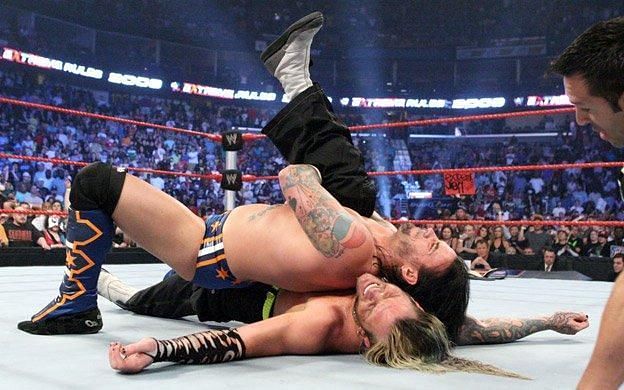 CM Punk cashed in the briefcase on the helpless Jeff Hardy