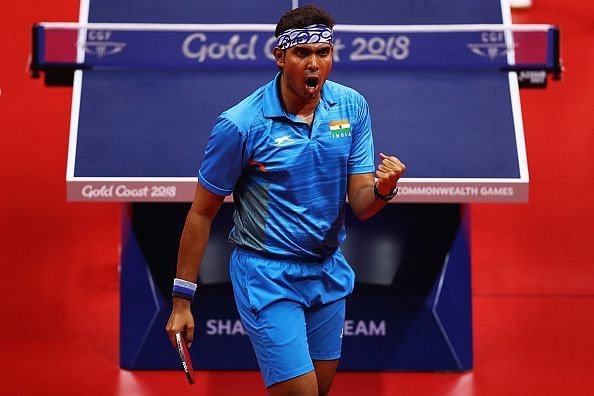 Sharath Achanta of India celebrates a point during a match