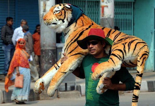 A Bangladesh fan arrives for the first m