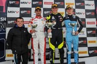 Kush Maini on the podium after Race 1 at Silverstone