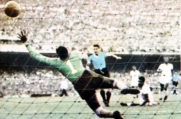 World Cup Final, 1950. Brazil. Maracana Stadium, Rio De Jainero. Brazil 1 v Uruguay 2. 16th July, 1950. Juan Schiaffino scores Uruguay&#039;s first goal past Brazilian keeper Barbosa.