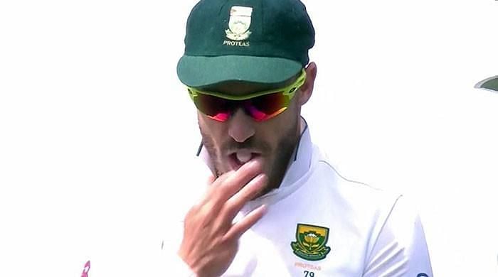 Faf Du Plessis caught. (the sweet can be seen in his mouth)