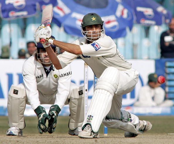 Pakistani batsman Younis Khan (R) plays
