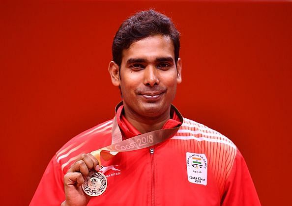 Achanta Sharath poses with his Bronze medal during the medal ceremony at 2018 CWG