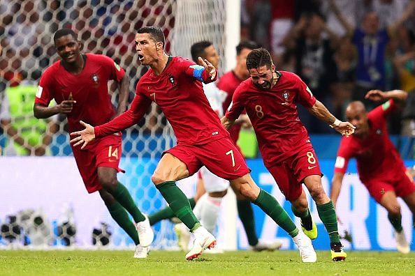 Cristiano Ronaldo exults after scoring against Spain at the 2018 FIFA World Cup