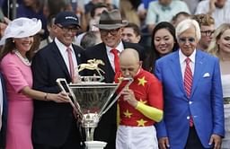 The Latest: Justify captures Triple Crown, wins Belmont
