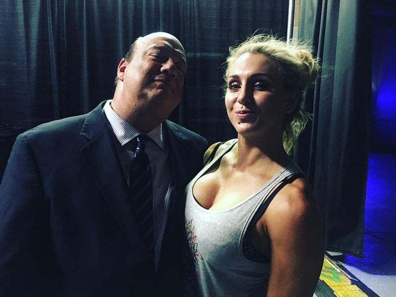 Paul Heyman with Charlotte Flair 