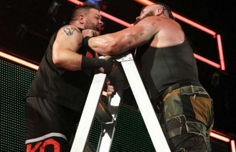 Image result for wwe braun strowman chokeslammedkevin owens of the ladder