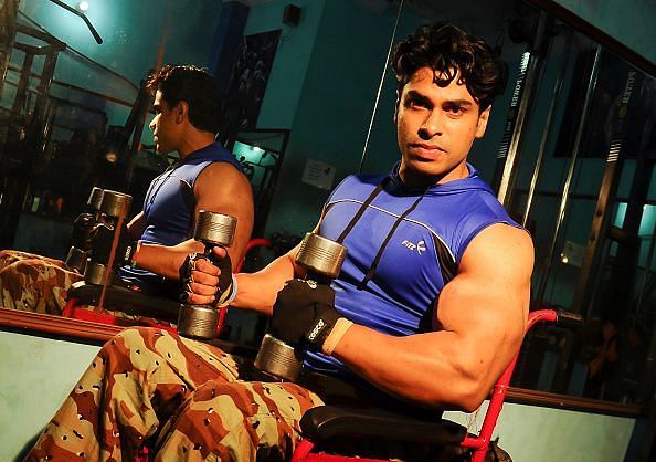 India&#039;s Professional Wheelchair Bodybuilder showing off his Biceps.